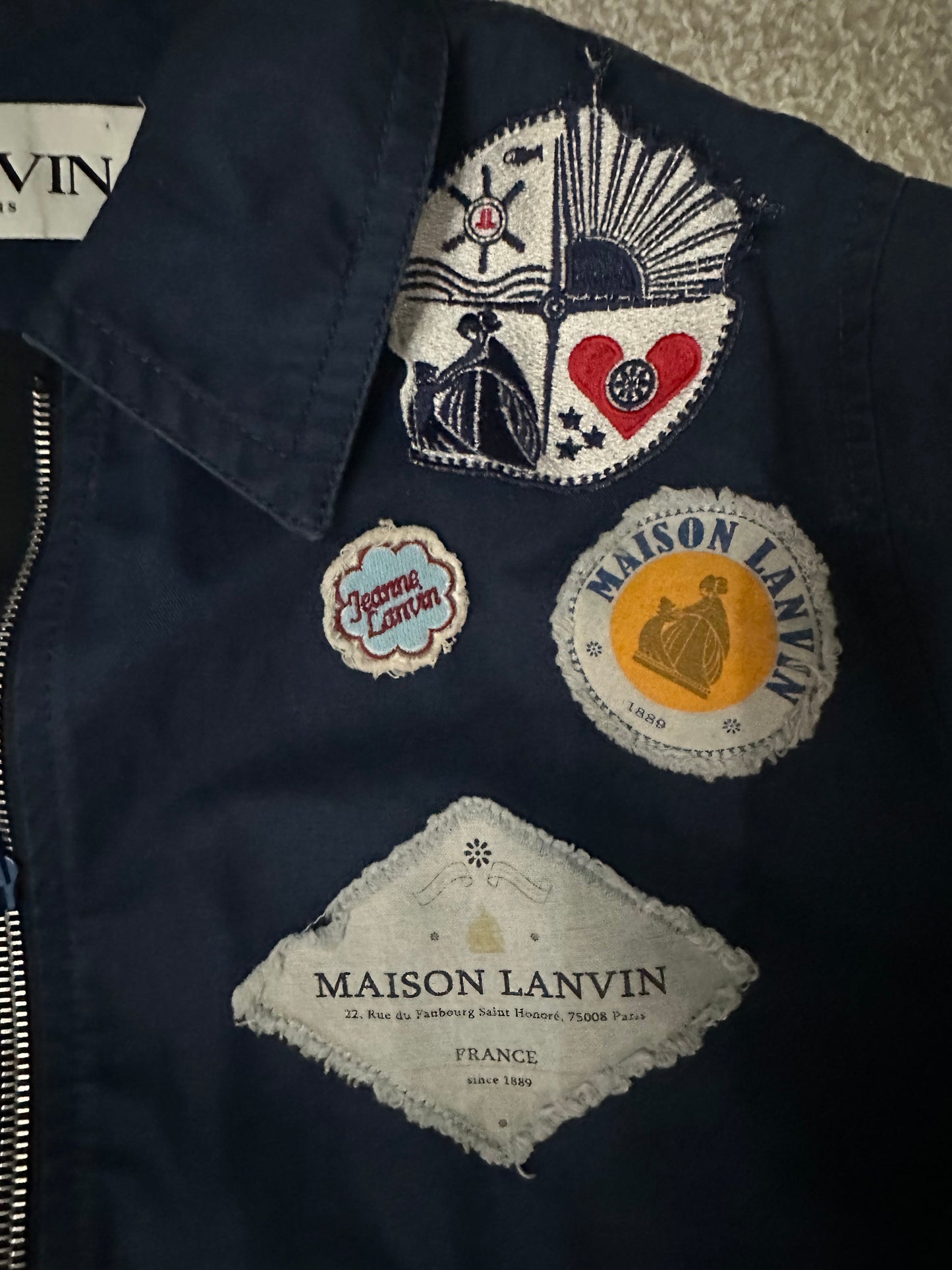 Lanvin Blue Bomber Jacket Pre owned Small featuring embroidered Maison Lanvin patches and logo details on the chest area.